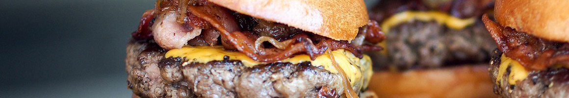 Eating Burger at The Burger Barn Rosenberg restaurant in Rosenberg, TX.